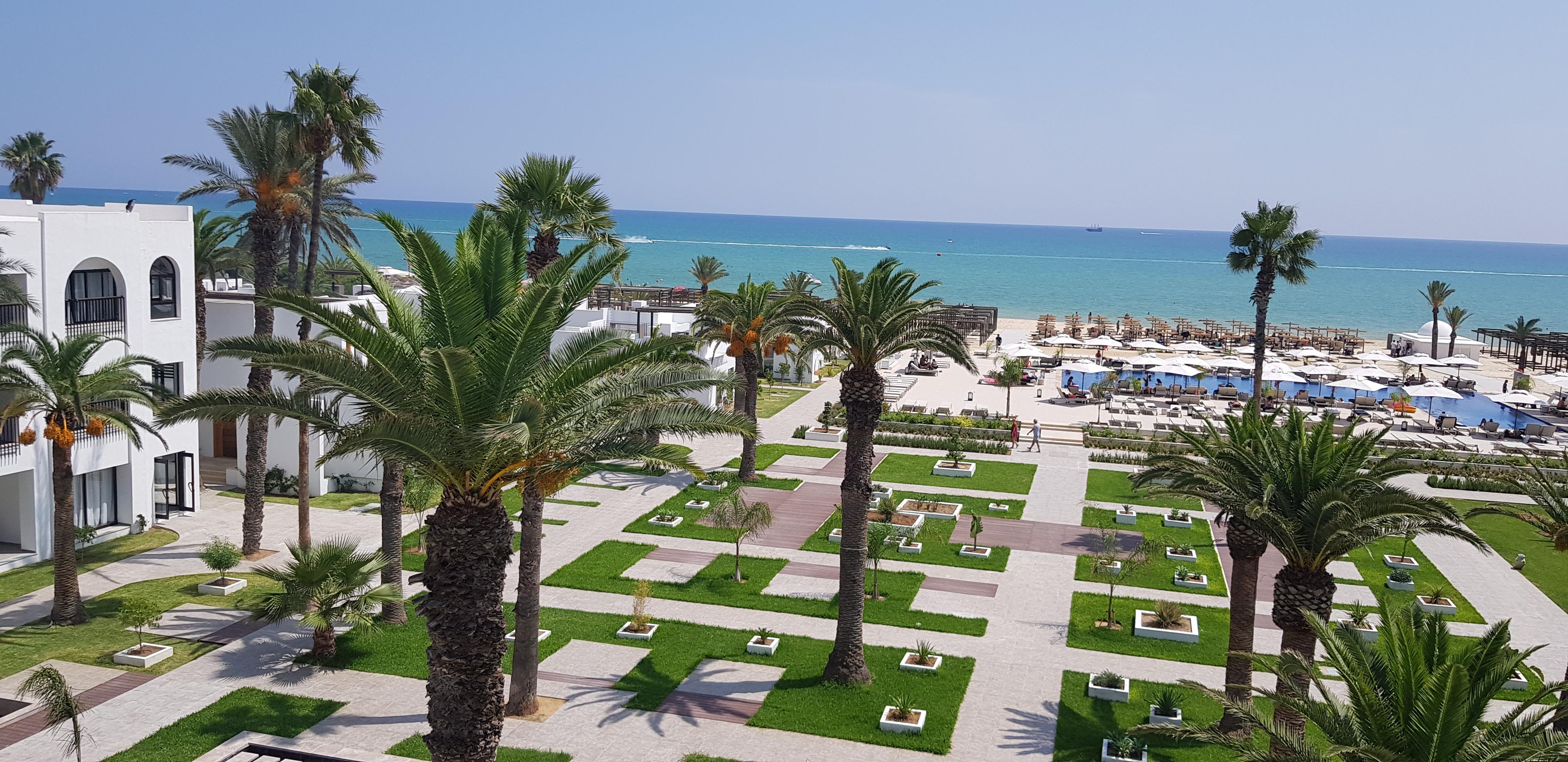 Les Orangers Garden Villas And Bungalows Ultra All Inclusive Хамамет Екстериор снимка A view of the beach in Hammamet
